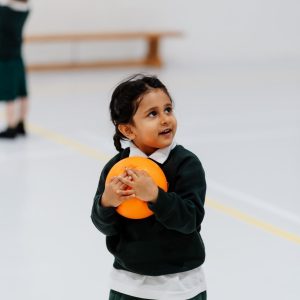 Prep school nursery - girl with ball