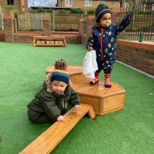 Prep school nursery - pupils on outdoor equipment