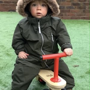Prep school nursery - pupil on tricycle