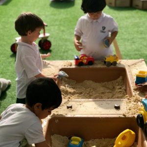 Prep school nursery - pupils playing in sandpit