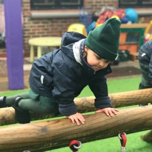 Prep school nursery - pupil climbing