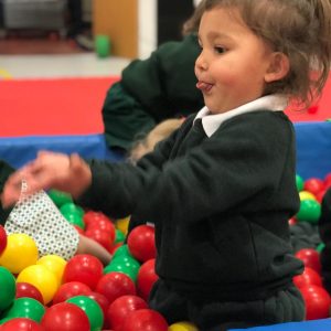Prep school nursery - pupil in ball pool