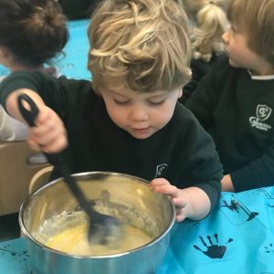 Prep school nursery - pupil cooking