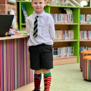 pupil wearing odd socks