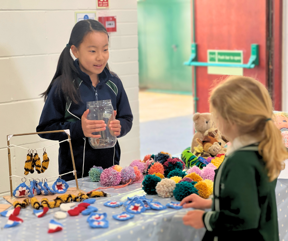 student selling crochet items